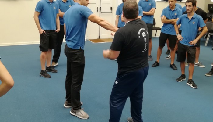 Year 7 PSHCE students get to grips with self-defense under the guidance of top martial arts expert.